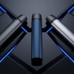 Premium pod system vape devices in different colors on dark surface