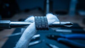 Vape coils and cotton wicking material close-up